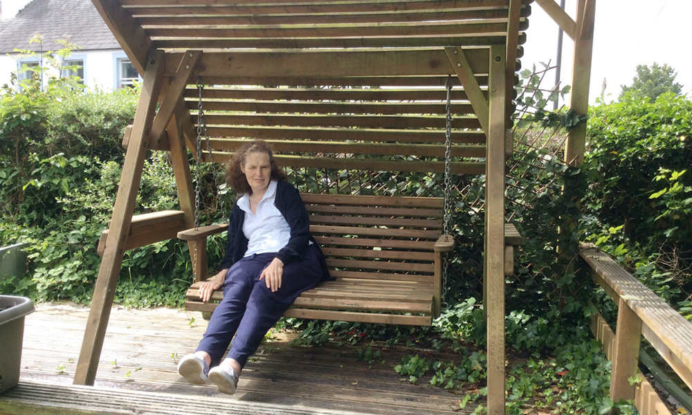 Elizabeth on a huge swinging seat